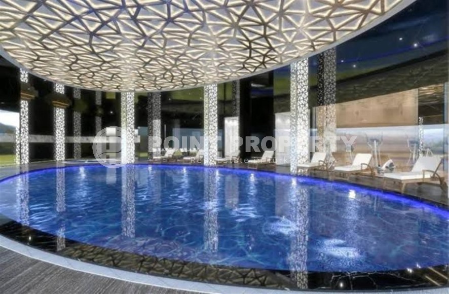 Bright, comfortable apartment with views of the city and the Taurus Mountains, in the center of the popular area of Alanya - Mahmutlar-id-7863-photo-8