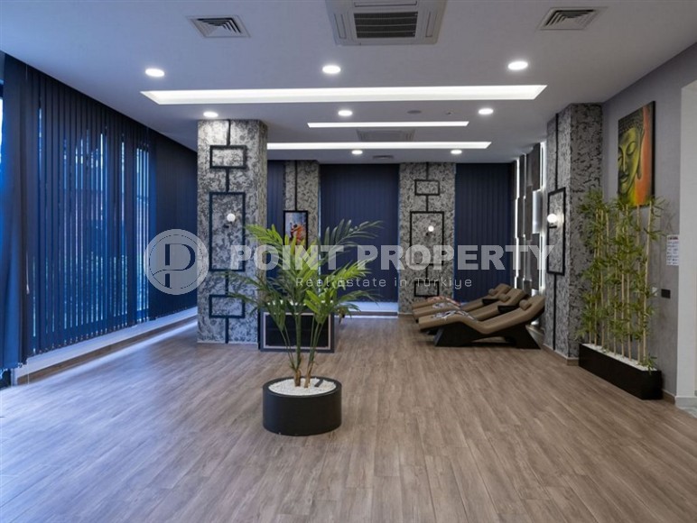 Bright, comfortable apartment with views of the city and the Taurus Mountains, in the center of the popular area of Alanya - Mahmutlar-id-7863-photo-11