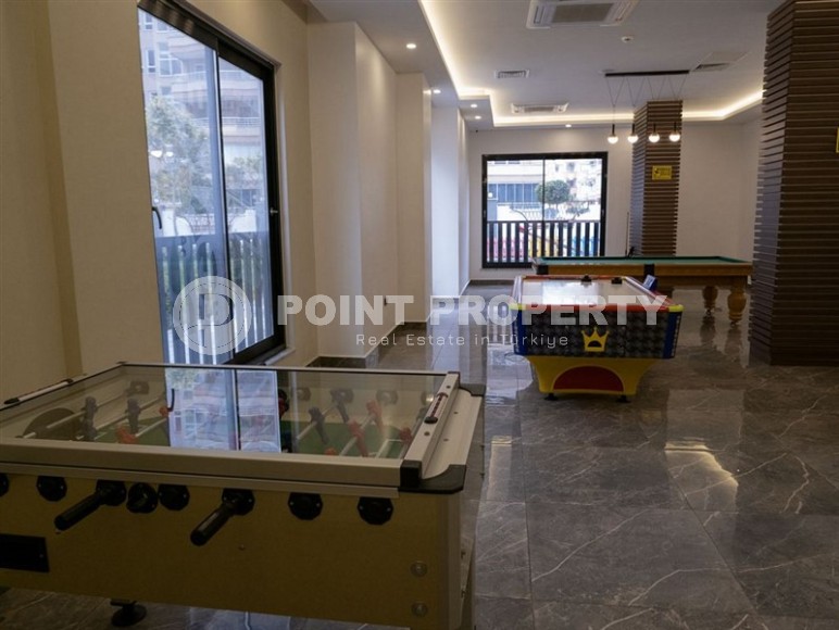 Bright, comfortable apartment with views of the city and the Taurus Mountains, in the center of the popular area of Alanya - Mahmutlar-id-7863-photo-12