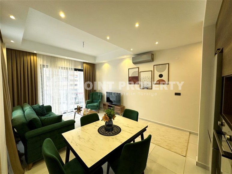 Stylish apartment with modern design 550 meters from the sea, in the center of Mahmutlar-id-7864-photo-4