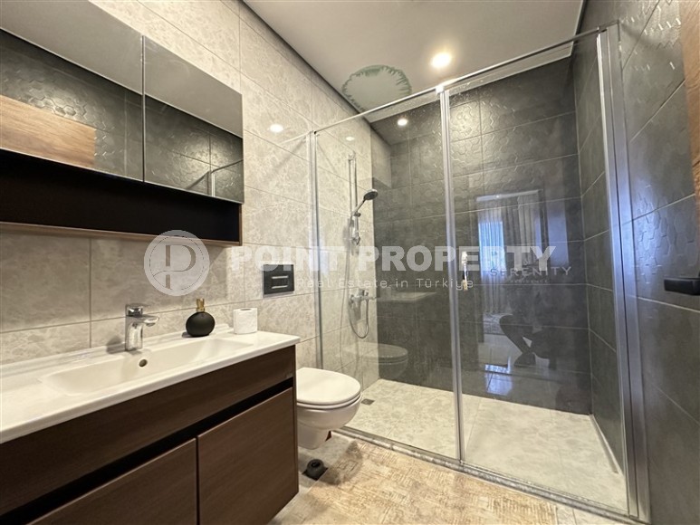 Stylish apartment with modern design 550 meters from the sea, in the center of Mahmutlar-id-7864-photo-11