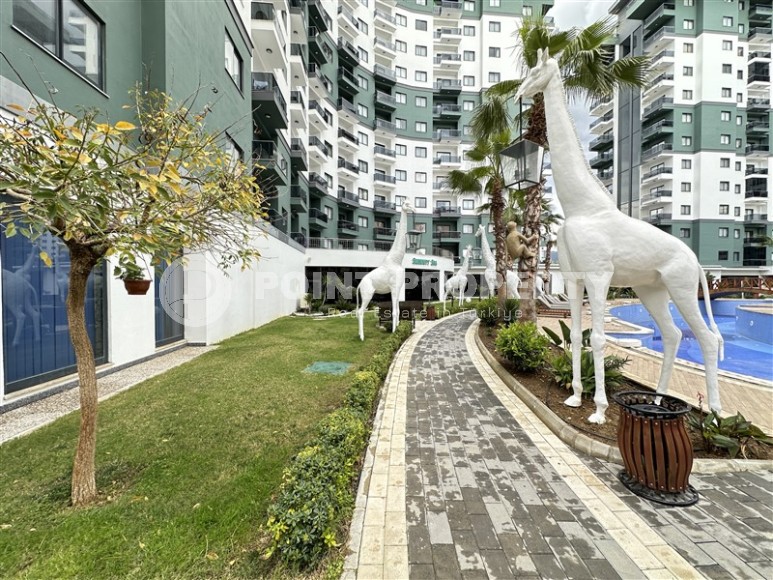 Stylish apartment with modern design 550 meters from the sea, in the center of Mahmutlar-id-7864-photo-17