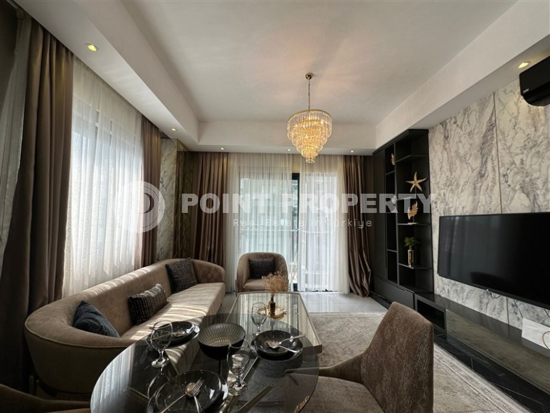 Стильная квартира с дизайнерским ремонтом в 550 метрах от моря, в центре современного района Аланьи - Махмутлар-id-7872-фото-2