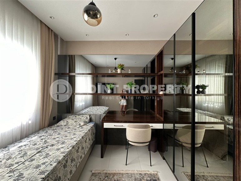 Стильная квартира с дизайнерским ремонтом в 550 метрах от моря, в центре современного района Аланьи - Махмутлар-id-7872-фото-9