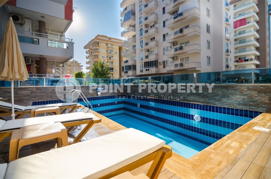 Comfortable 2+1 apartment with spacious glazed balconies in the center of Mahmutlar-id-7882-photo-21