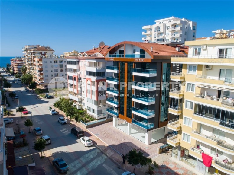 Comfortable 2+1 apartment with spacious glazed balconies in the center of Mahmutlar-id-7882-photo-27