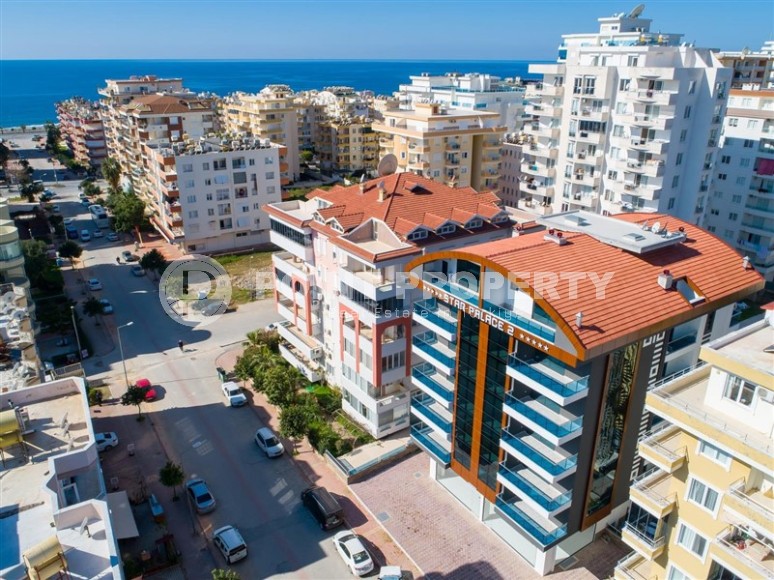 Comfortable 2+1 apartment with spacious glazed balconies in the center of Mahmutlar-id-7882-photo-28