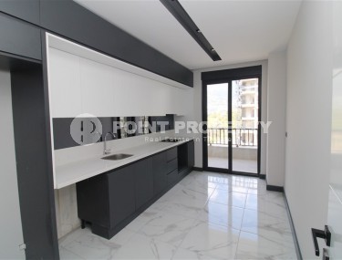 Spacious linear apartment 2+1 with fine finishing, in the center of Mahmutlar district-id-7884-photo-4