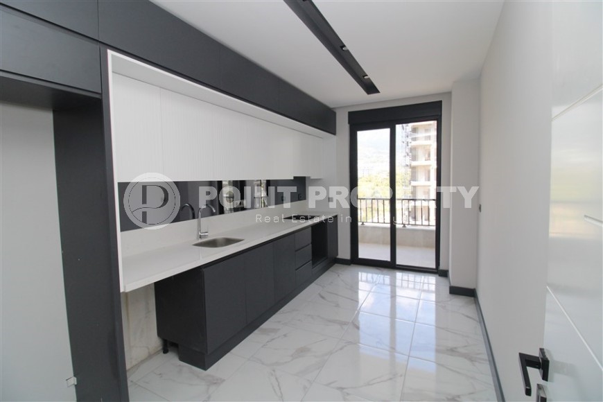 Просторная линейная квартира 2+1 с чистовой отделкой, в центре района Махмутлар-id-7884-фото-4