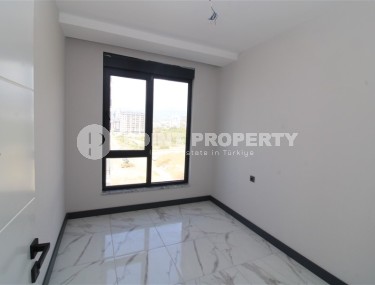 Spacious linear apartment 2+1 with fine finishing, in the center of Mahmutlar district-id-7884-photo-5