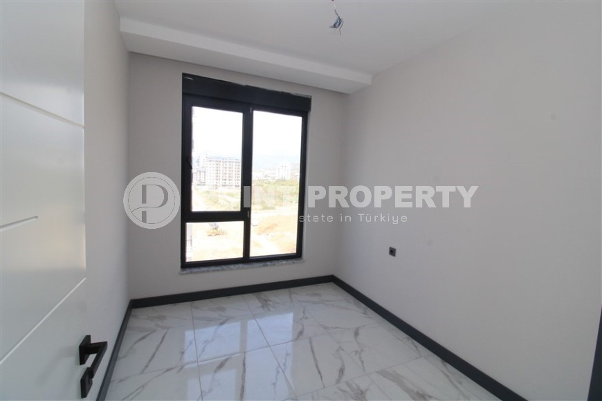 Просторная линейная квартира 2+1 с чистовой отделкой, в центре района Махмутлар-id-7884-фото-5