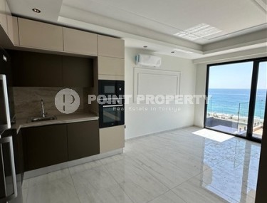 Panoramic apartment with sea views on the 9th floor in an ultra-modern residential complex, in the center of Mahmutlar-id-7885-photo-2