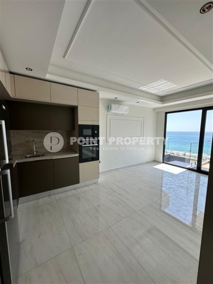 Panoramic apartment with sea views on the 9th floor in an ultra-modern residential complex, in the center of Mahmutlar-id-7885-photo-2