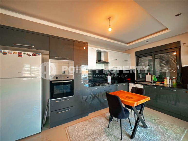 Spacious 2+1 apartment with a total area of 110 m2, with a top location within walking distance from the sea and the center of Oba district-id-7887-photo-2