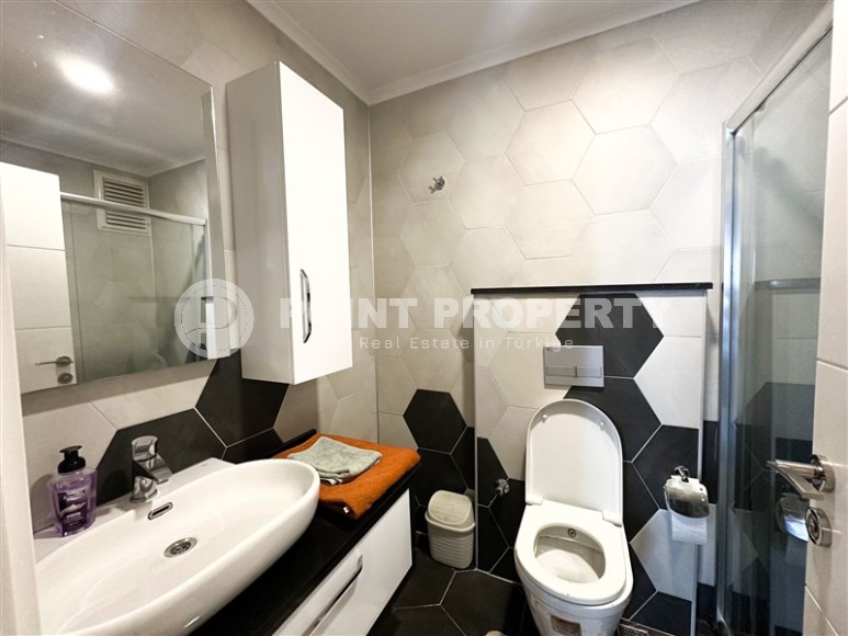 Spacious 2+1 apartment with a total area of 110 m2, with a top location within walking distance from the sea and the center of Oba district-id-7887-photo-9