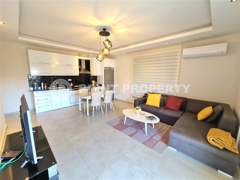 Spacious 1+1 apartment with a total area of 75 m2, in the center of the popular resort area of Alanya - Oba-id-7888-photo-2