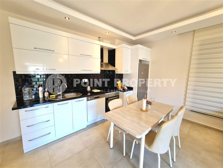 Spacious 1+1 apartment with a total area of 75 m2, in the center of the popular resort area of Alanya - Oba-id-7888-photo-3
