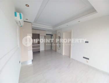 New apartment with a luxurious location on the first line from the sea, in the center of Mahmutlar-id-7901-photo-2