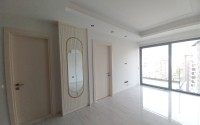 New apartment with a luxurious location on the first line from the sea, in the center of Mahmutlar-id-7901-photo-3
