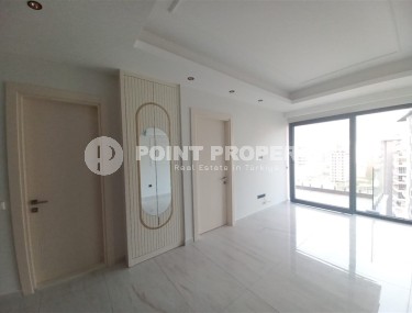 New apartment with a luxurious location on the first line from the sea, in the center of Mahmutlar-id-7901-photo-3