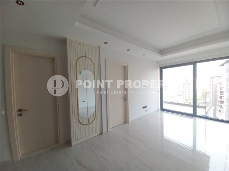 New apartment with a luxurious location on the first line from the sea, in the center of Mahmutlar-id-7901-photo-3