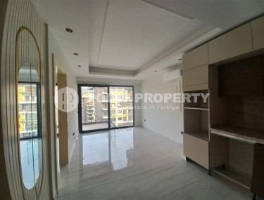 New apartment with a luxurious location on the first line from the sea, in the center of Mahmutlar-id-7901-photo-4