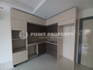 New apartment with a luxurious location on the first line from the sea, in the center of Mahmutlar-id-7901-photo-5