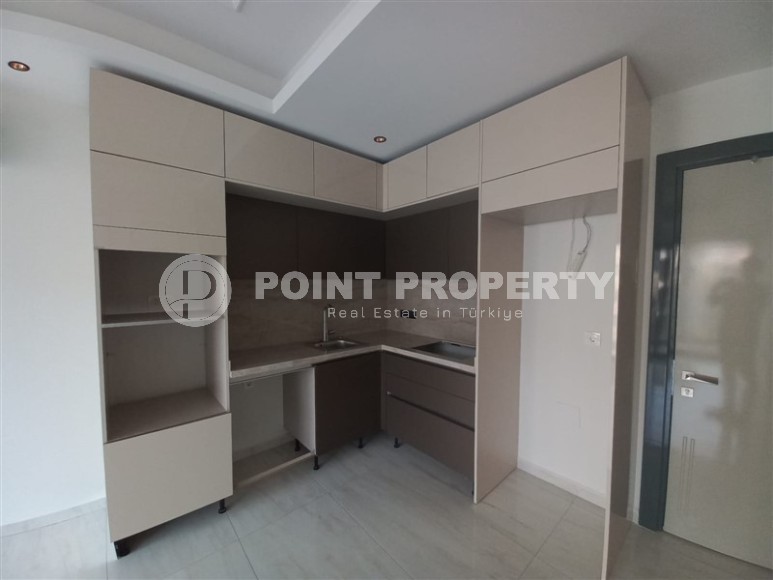 New apartment with a luxurious location on the first line from the sea, in the center of Mahmutlar-id-7901-photo-5