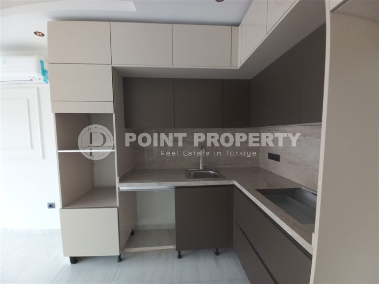 New apartment with a luxurious location on the first line from the sea, in the center of Mahmutlar-id-7901-photo-6