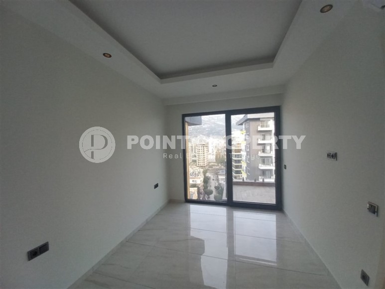 New apartment with a luxurious location on the first line from the sea, in the center of Mahmutlar-id-7901-photo-8