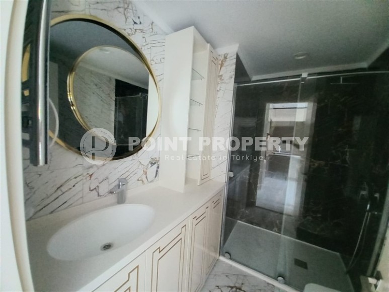 New apartment with a luxurious location on the first line from the sea, in the center of Mahmutlar-id-7901-photo-9