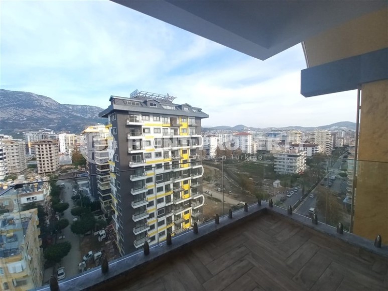 New apartment with a luxurious location on the first line from the sea, in the center of Mahmutlar-id-7901-photo-10