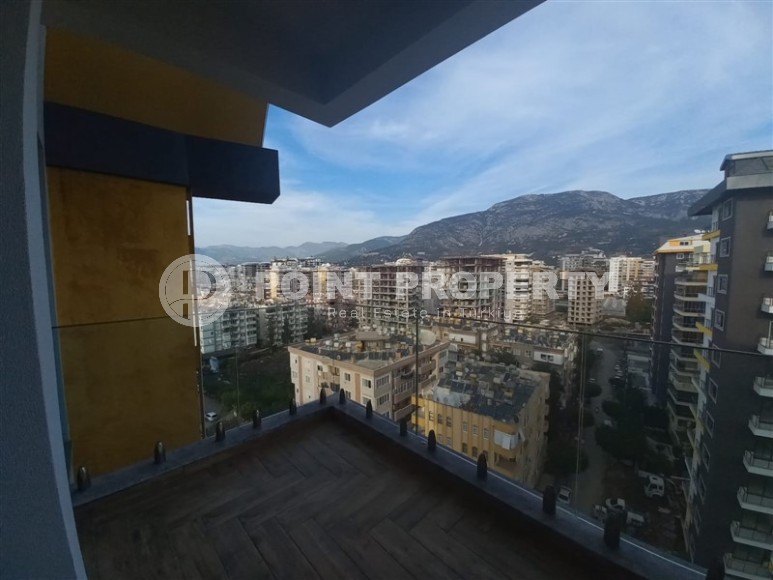 New apartment with a luxurious location on the first line from the sea, in the center of Mahmutlar-id-7901-photo-11
