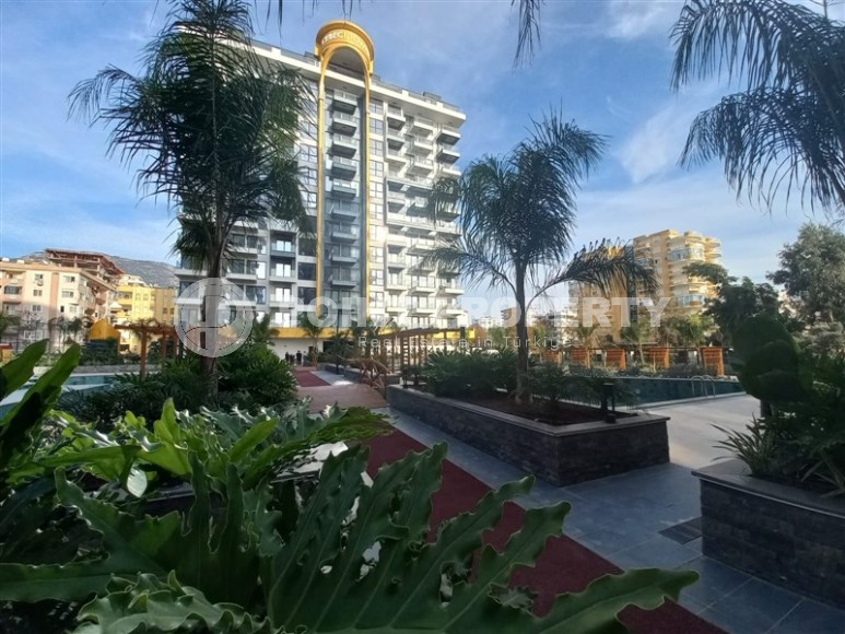 New apartment with a luxurious location on the first line from the sea, in the center of Mahmutlar-id-7901-photo-19