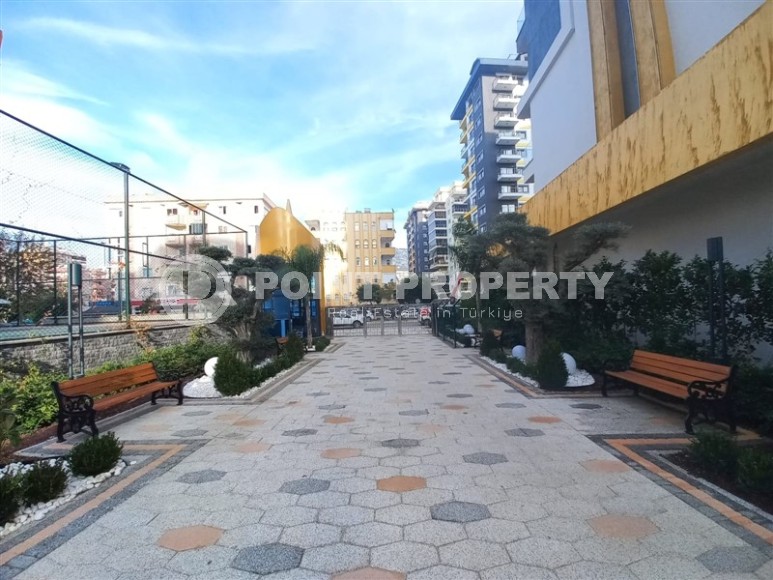 New apartment with a luxurious location on the first line from the sea, in the center of Mahmutlar-id-7901-photo-22