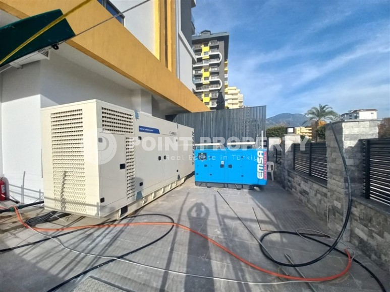 New apartment with a luxurious location on the first line from the sea, in the center of Mahmutlar-id-7901-photo-23