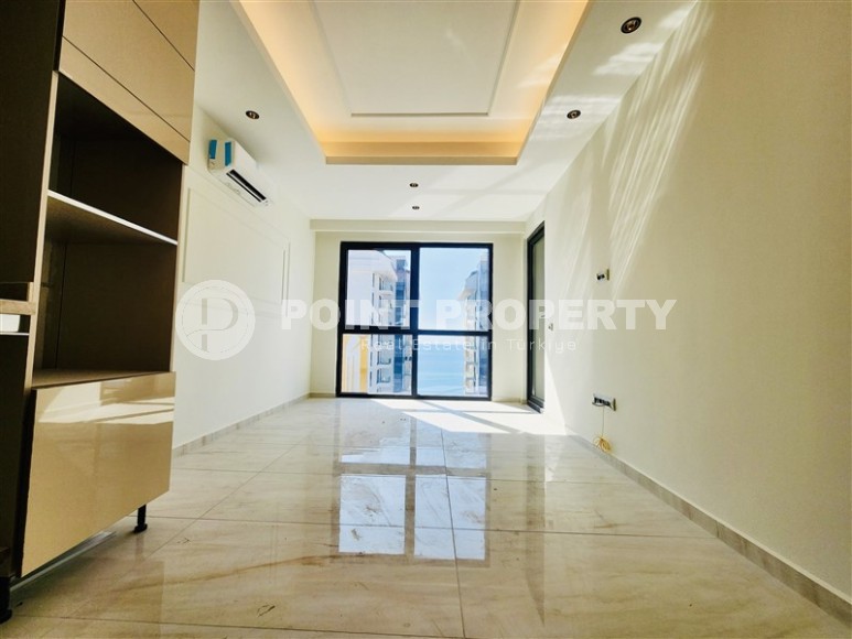 New 1+1 apartment with panoramic sea views, in the center of the modern area of Alanya - Mahmutlar-id-7903-photo-2