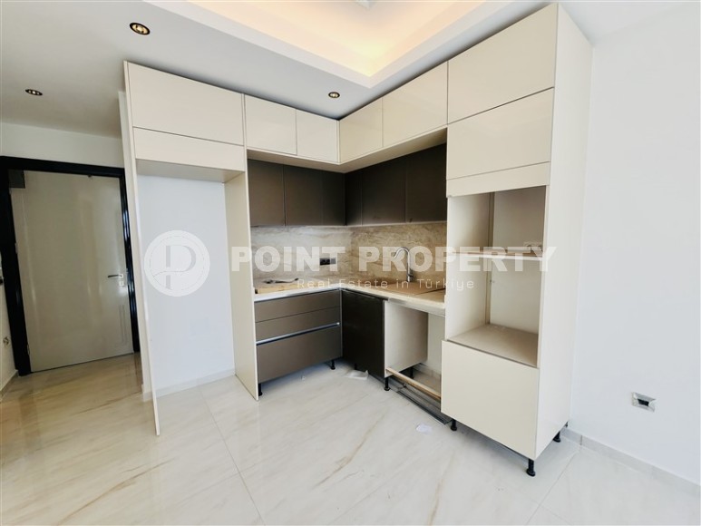 New 1+1 apartment with panoramic sea views, in the center of the modern area of Alanya - Mahmutlar-id-7903-photo-5