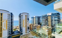 New 1+1 apartment with panoramic sea views, in the center of the modern area of Alanya - Mahmutlar-id-7903-photo-11