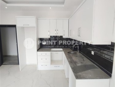 Inexpensive apartment with fine finishing 1200 meters from the sea, in the promising resort area of Alanya - Avsallar-id-7904-photo-3