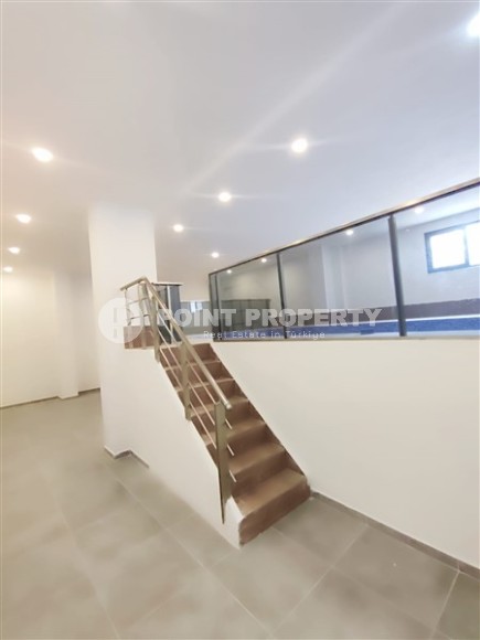 Inexpensive apartment with fine finishing 1200 meters from the sea, in the promising resort area of Alanya - Avsallar-id-7904-photo-11