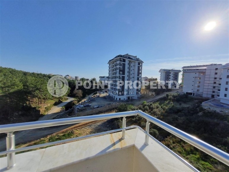 New two-level apartment 2+1 overlooking a pine grove, one and a half kilometers from the sea-id-7906-photo-10