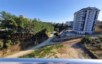 New two-level apartment 2+1 overlooking a pine grove, one and a half kilometers from the sea-id-7906-photo-13