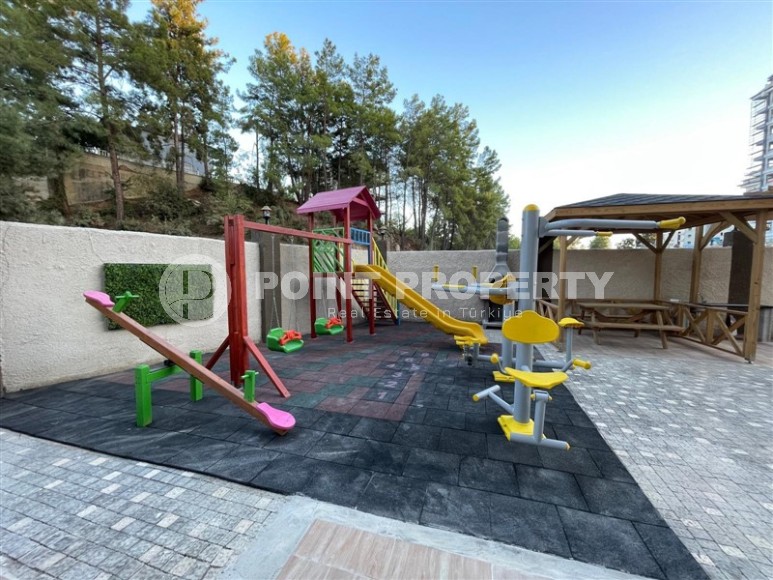 New two-level apartment 2+1 overlooking a pine grove, one and a half kilometers from the sea-id-7906-photo-19