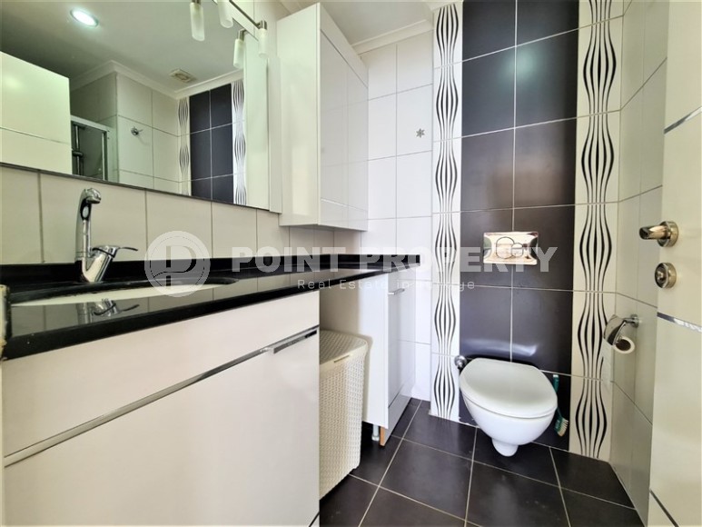 Атмосферная квартира 2+1 с современным дизайном, стильной мебелью и бытовой техникой в спокойном районе Аланьи - Тосмур-id-7921-фото-12