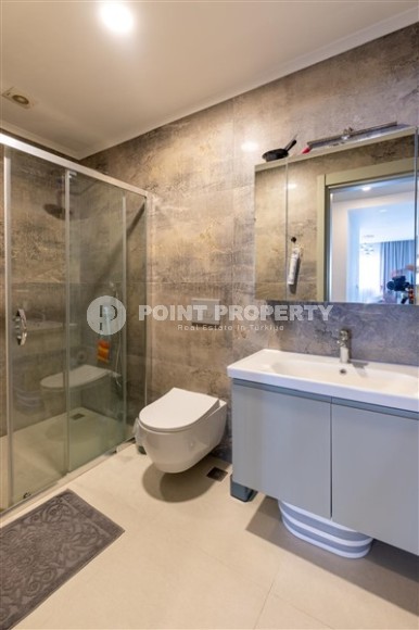 Благоустроенная квартира 2+1 на первой линии от моря, в центре престижного района Аланьи - Кестель-id-7927-фото-12