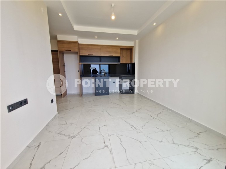 New 1+1 apartment with high-quality finishing in a modern area of Alanya - Mahmutlar-id-7932-photo-2