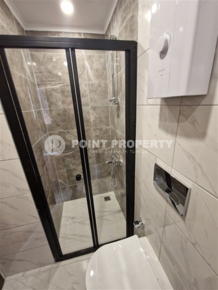 New 1+1 apartment with high-quality finishing in a modern area of Alanya - Mahmutlar-id-7932-photo-7