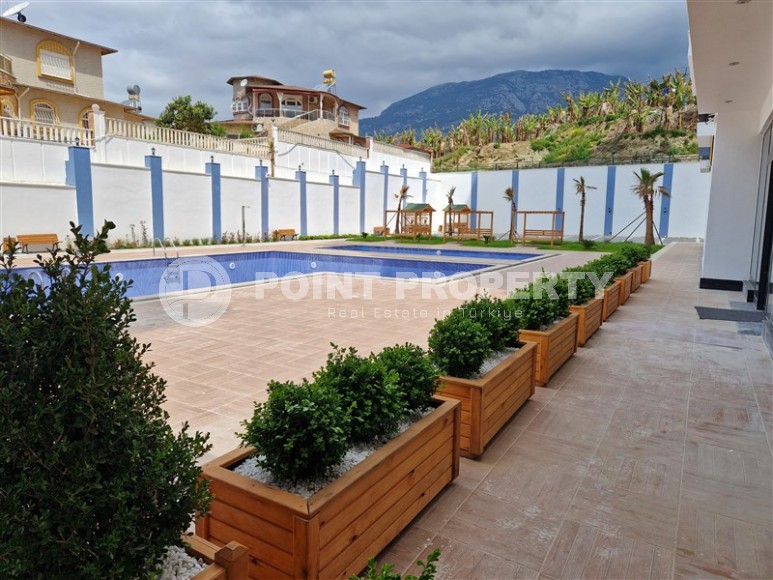 New 1+1 apartment with high-quality finishing in a modern area of Alanya - Mahmutlar-id-7932-photo-18