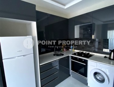 Ready-to-move-in apartment 1+1, with a total area of 45 m2, on the 1st floor in a new residential complex with hotel infrastructure-id-7933-photo-3